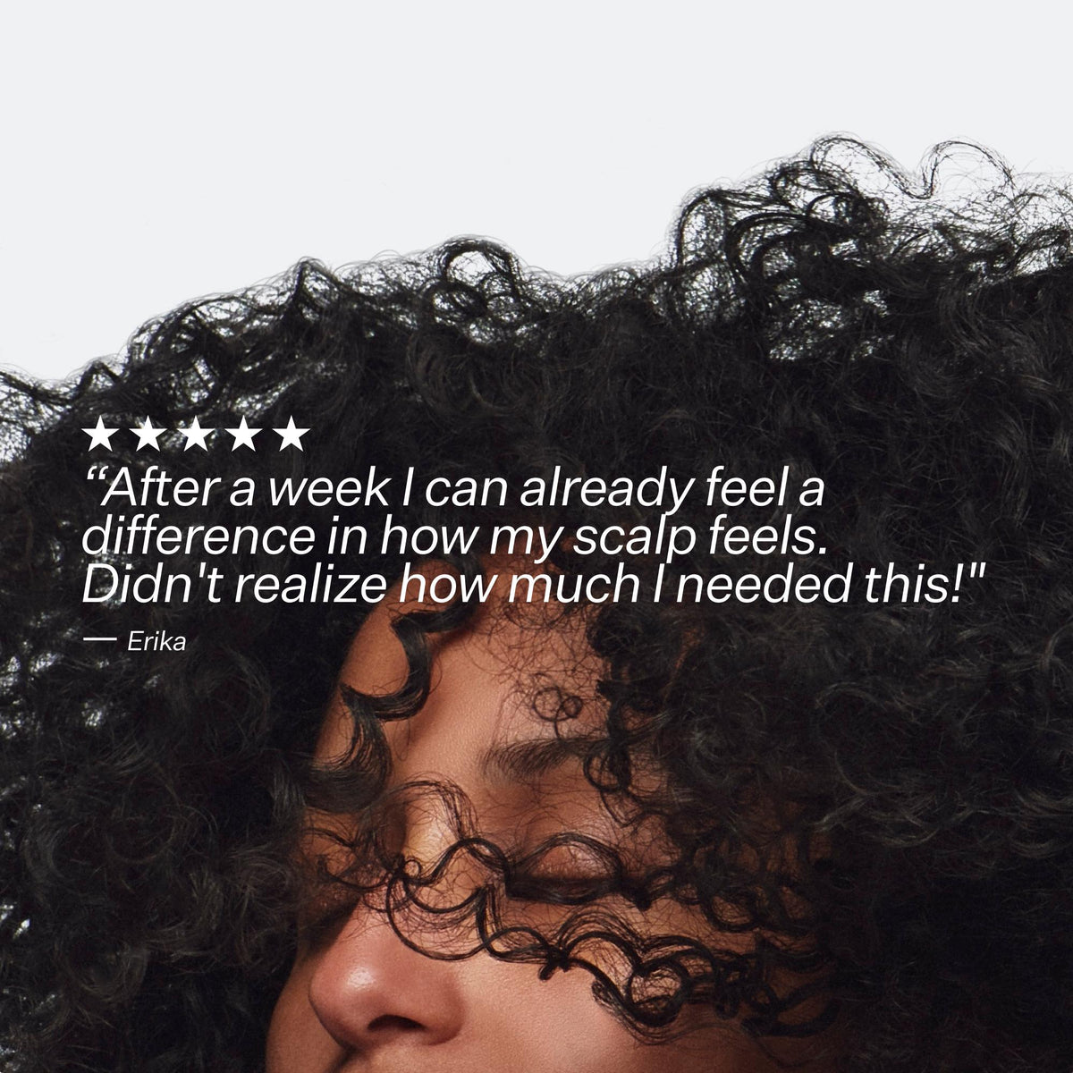 Close-up of a person with textured hair, overlaid with a quote and star rating.