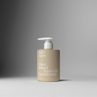 A beige pump bottle of Act+ Acre Plant Based Stem Cell Conditioner, set against a clean gray gradient background.