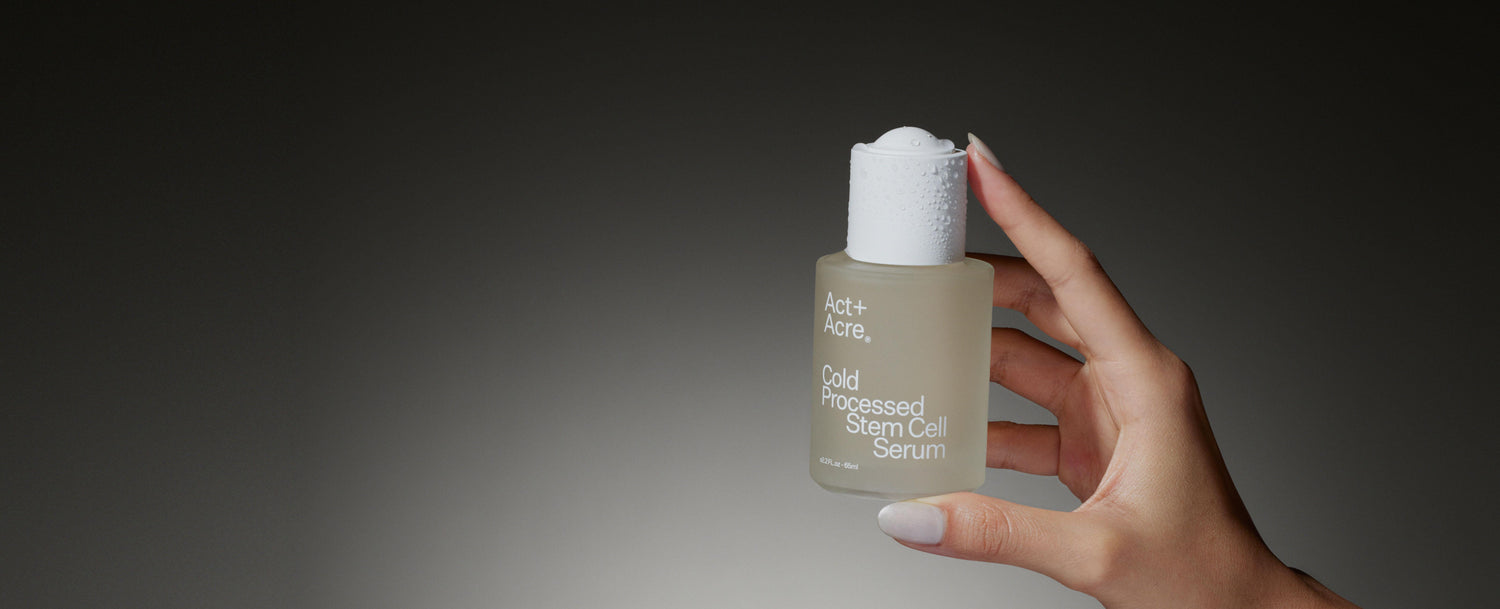 Hand holding Act+Acre Stem Cell Stem Cell Scalp Serum
